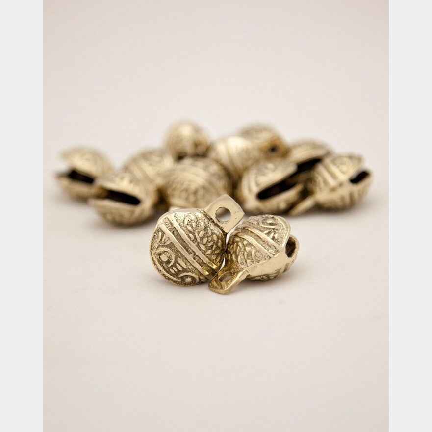 Dozen Single-Cut Embossed Brass Bells