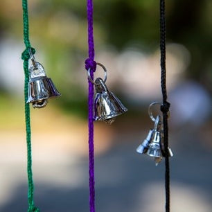 Ten Nickel Plated Mini Brass Bells on 30 Inch Cord