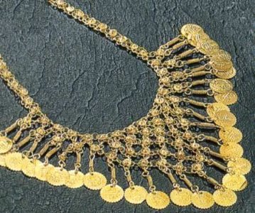 Gold-Tone White Metal Alloy Necklace with Coins - Eye-catching Statement Piece